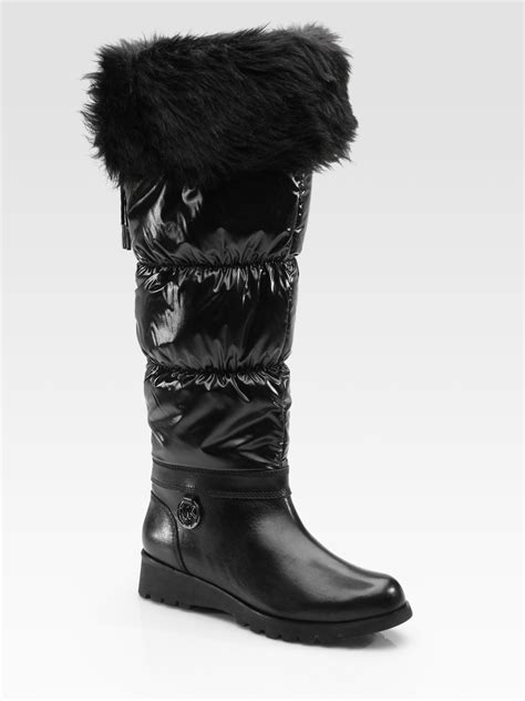 michael kors black snow boots|Michael Kors women winter boots.